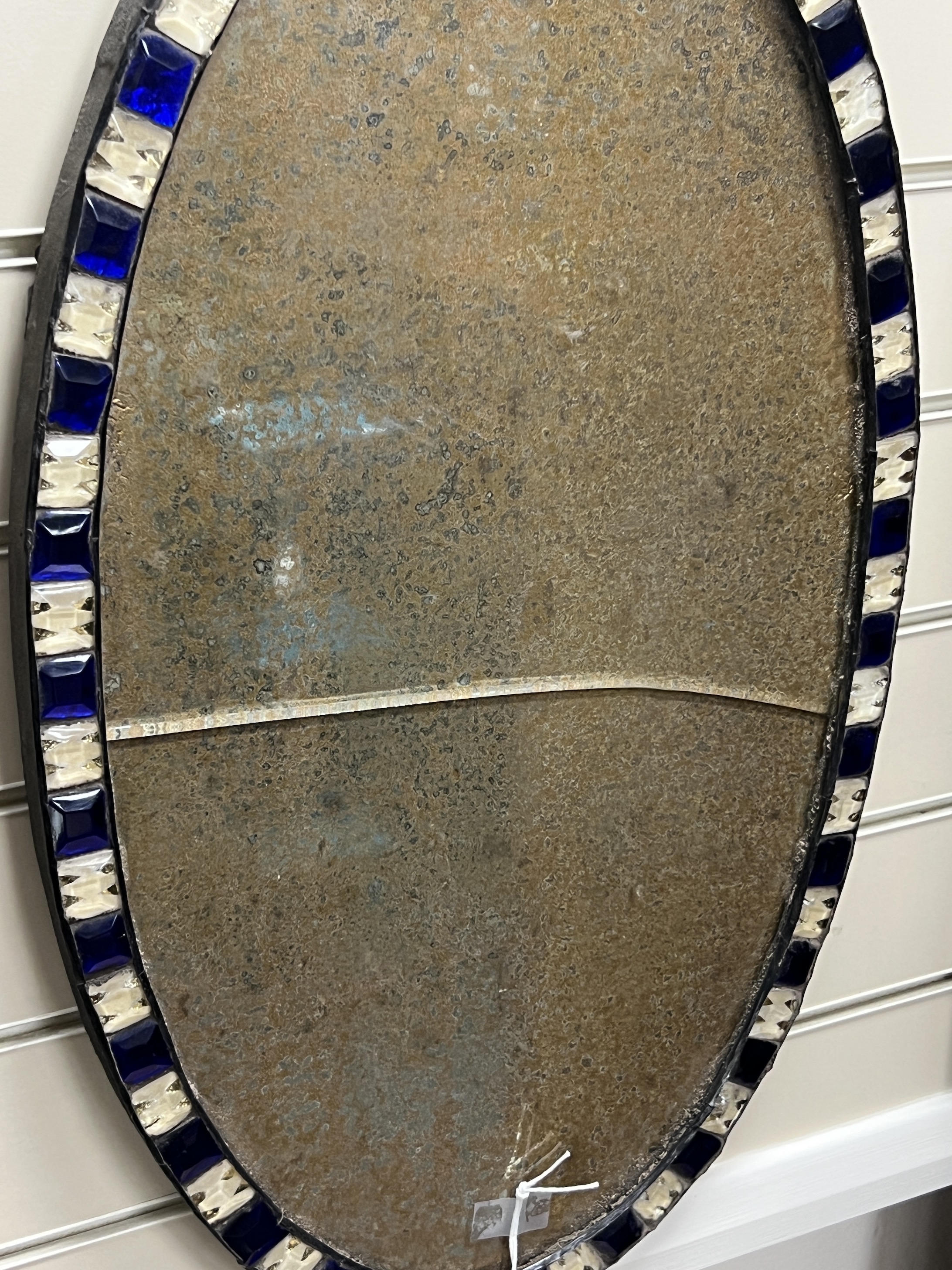 An Irish style oval wall mirror, width 38cm, height 66cm